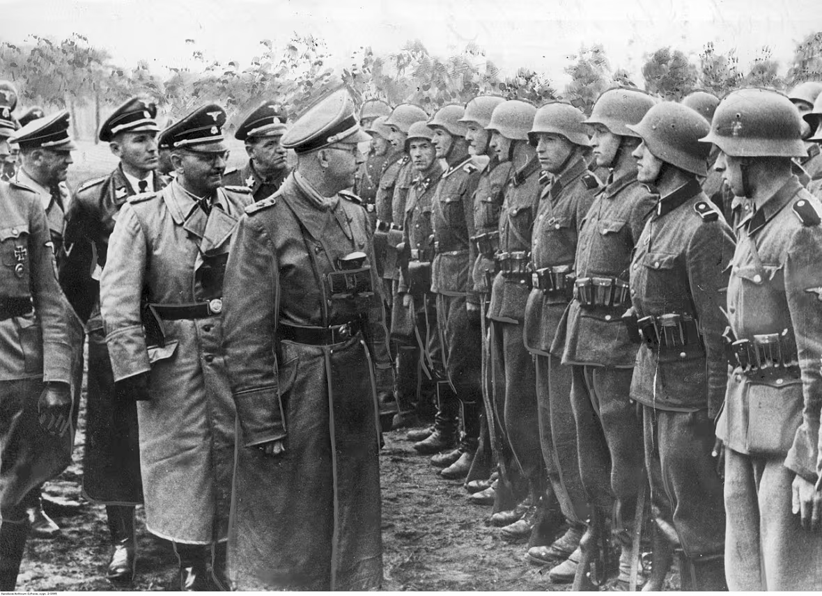 Heinrich Himmler, one of the top Nazi officials, inspects a line of troops with the 1st Galician Division, also known as the 14th Waffen Grenadier Division of the SS, in an undated photo.